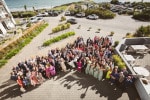 The wedding party and guests photographed from above at Inchydoney Island Lodge and Spa