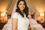 A smiling bride in the bridal suit of the Maryborough hotel and spa
